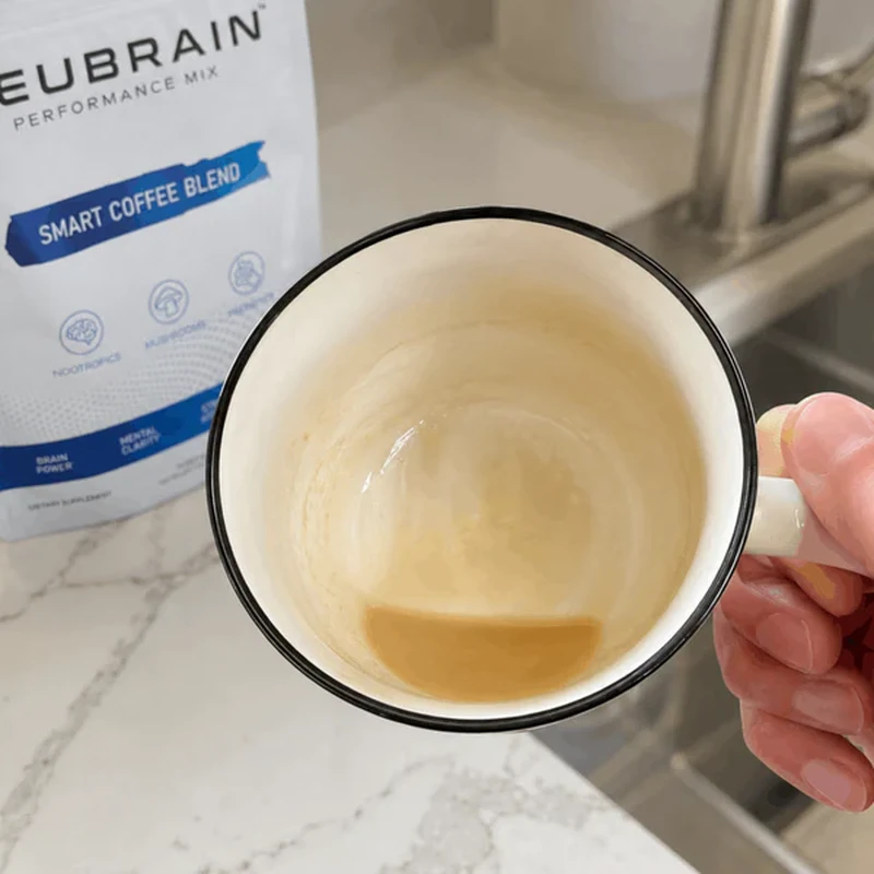 Emptied Neubrain mug with a clean bottom, no grit or sludge.
